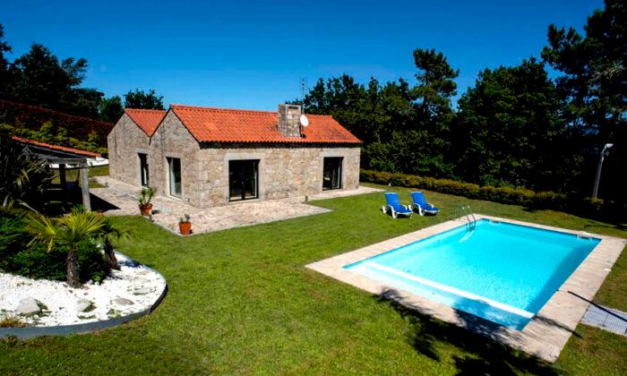 A single-family ranch home in Valenca-Minho, Portugal listed for 290,000 euro or $327,129. (Courtesy of Infinite Solutions)