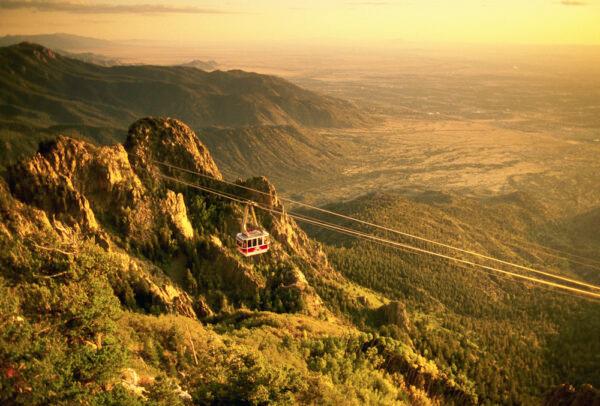 The Sandia Peak Tramway takes visitors high above dramatic terrain. Sunset is especially beautiful from the observation deck atop Sandia Peak. (The Image Bank/Getty)