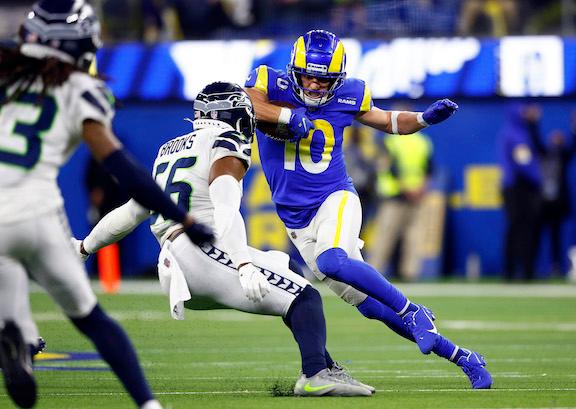 Cooper Kupp #10 of the Los Angeles Rams runs against Jordyn Brooks #56 of the Seattle Seahawks at SoFi Stadium in Inglewood, Calif., on Dec. 21, 2021. (Ronald Martinez/Getty Images)