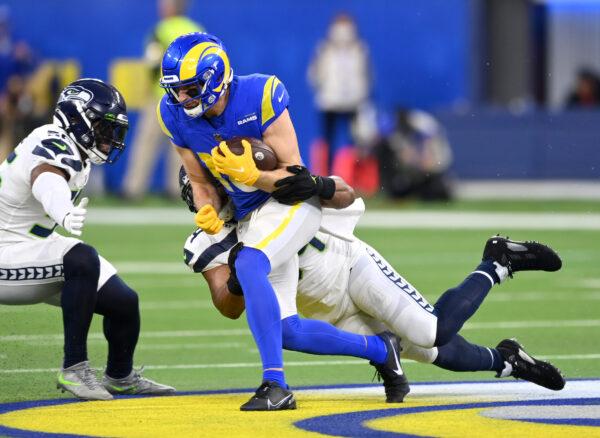 Ben Skowronek #18 of the Los Angeles Rams runs the ball after a complete pass in the game against the Seattle Seahawks at SoFi Stadium in Inglewood, Calif., on Dec. 21, 2021. (Jayne Kamin-Oncea/Getty Images)
