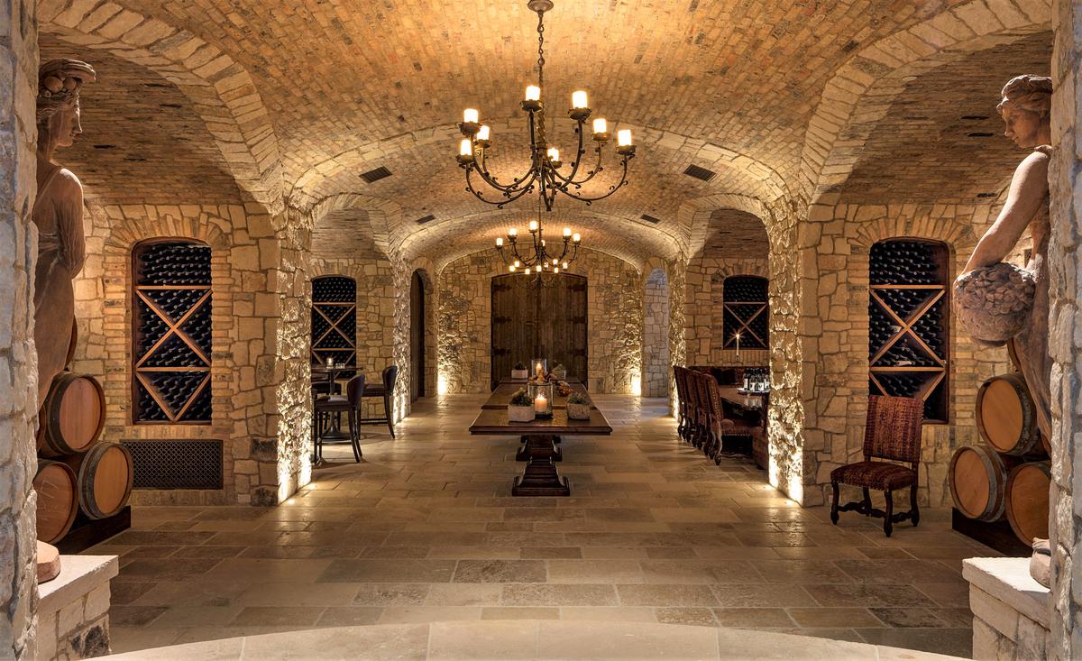 Befitting the estate’s location in a key wine region, the cavernous wine cellar has its own kitchen, dining areas, wine tasting lounge, and plenty of space for wines from the 18 varietals grown on the estate. (Matthew Walla/Jade Mills)