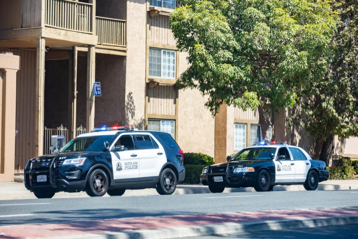 Santa Ana Police officers pull over a driver in Santa Ana, Calif., on Sept. 20, 2021. (John Fredricks/The Epoch Times)