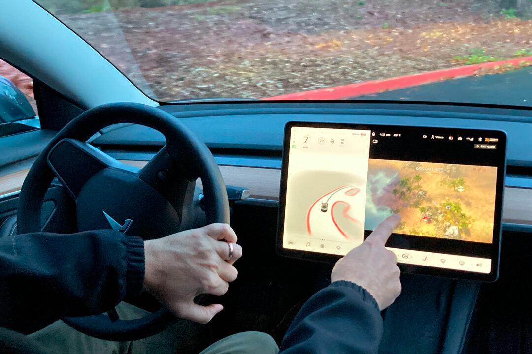 Tesla to Halt Games on Infotainment Screens in Moving Cars