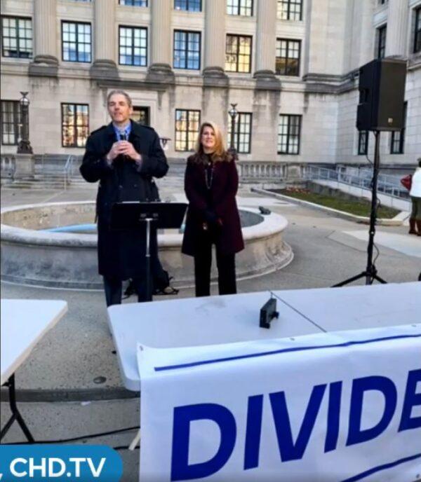 Assemblyman Jay Webber (L) and Assemblywoman Serena DiMaso (R) speak at the United We Stand Freedom Rally in Trenton, N.J., on Dec. 20, 2021. (Courtesy of Children's Health Defense/CDH.TV/Screenshot via The Epoch Times)