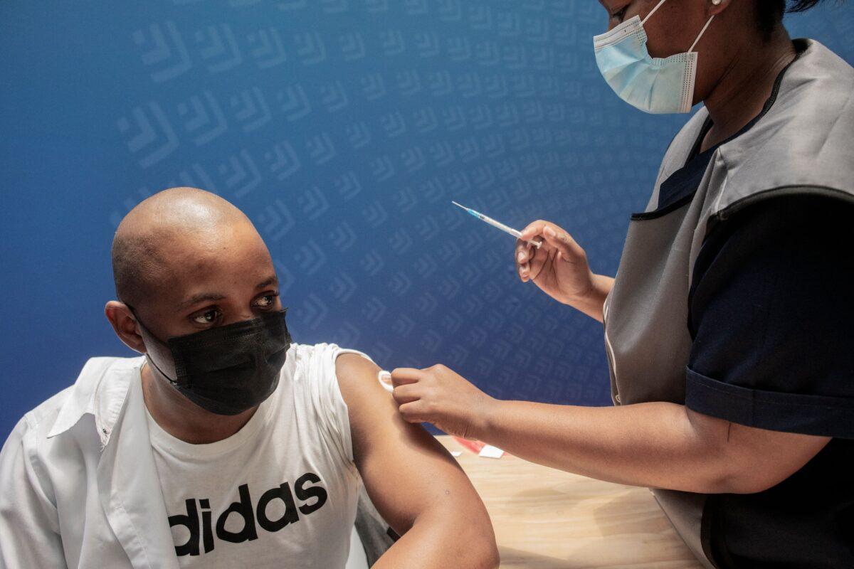 A man receives a dose of the Pfizer/BioNTech COVID-19 vaccine in Johannesburg, South Africa on Dec. 15, 2021. (Luca Sola/AFP via Getty Images)