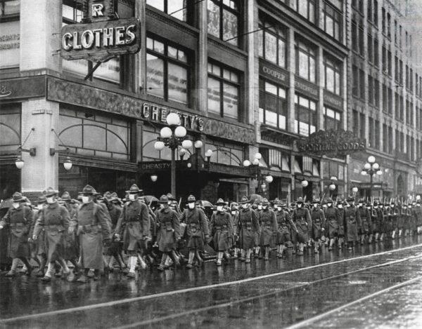 U.S. 39th regiment in Seattle, wear masks to prevent influenza. Dec. 1918. The soldiers were on their way to France during the 1918-19 'Spanish' Influenza pandemic. By Everett Collection/Shutterstock
