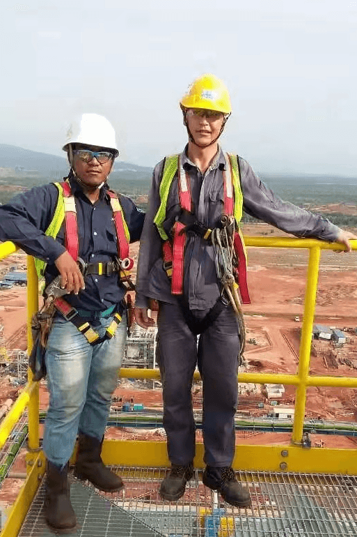 Xiao Yonghong (R) at a job site in Malaysia; the photo was taken sometime between 2016 and 2018. (Courtesy of Xiao Yonghong)