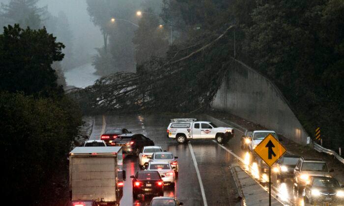 2 Dead in Submerged Car as California Storm Worries Spread