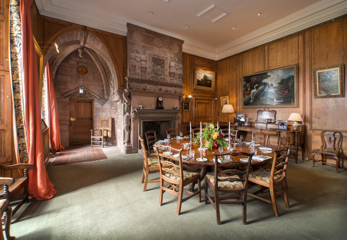 The exquisite family dining room, with a seating for 10, has another of the castle’s famous hand-carved fireplaces as its central focus. Careston Castle is a splendid mix of hominess and grandeur. (Courtesy of Itago Media Ltd.)