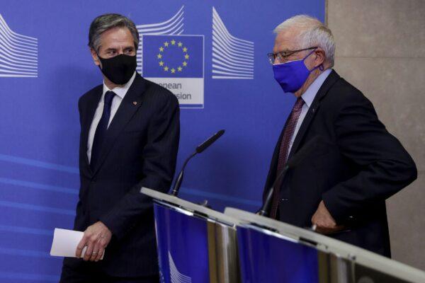 U.S. Secretary of State Antony Blinken (L) and the European Union's Josep Borrell arrive to give a press conference ahead of their meeting at the EU headquarters in Brussels, on March 24, 2021. (Olivier Hoslet/POOL/AFP via Getty Images)