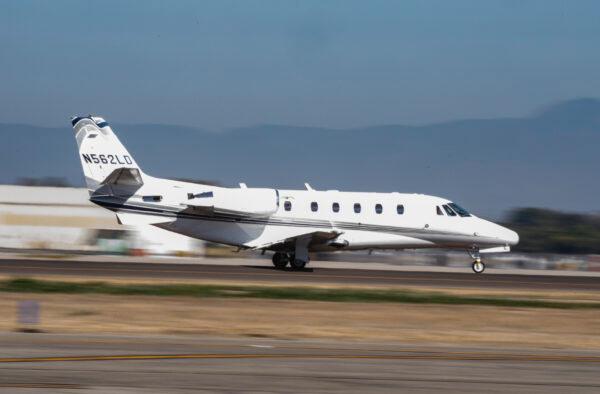 A private jet lands at Long Beach Airport on Sept. 13, 2021. (John Fredricks/The Epoch Times)