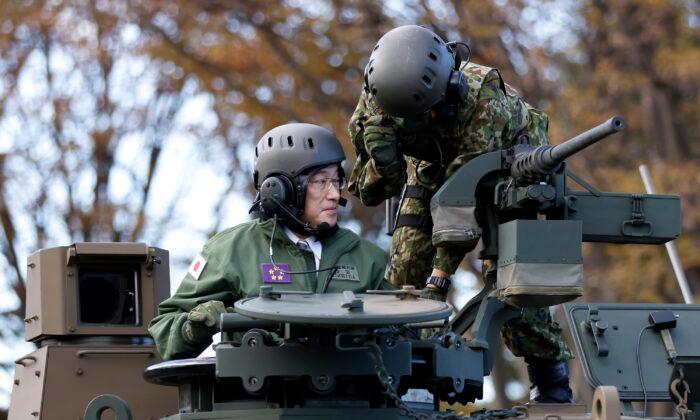 Japan Cabinet OKs Record Defense Budget Amid Taiwan Concerns