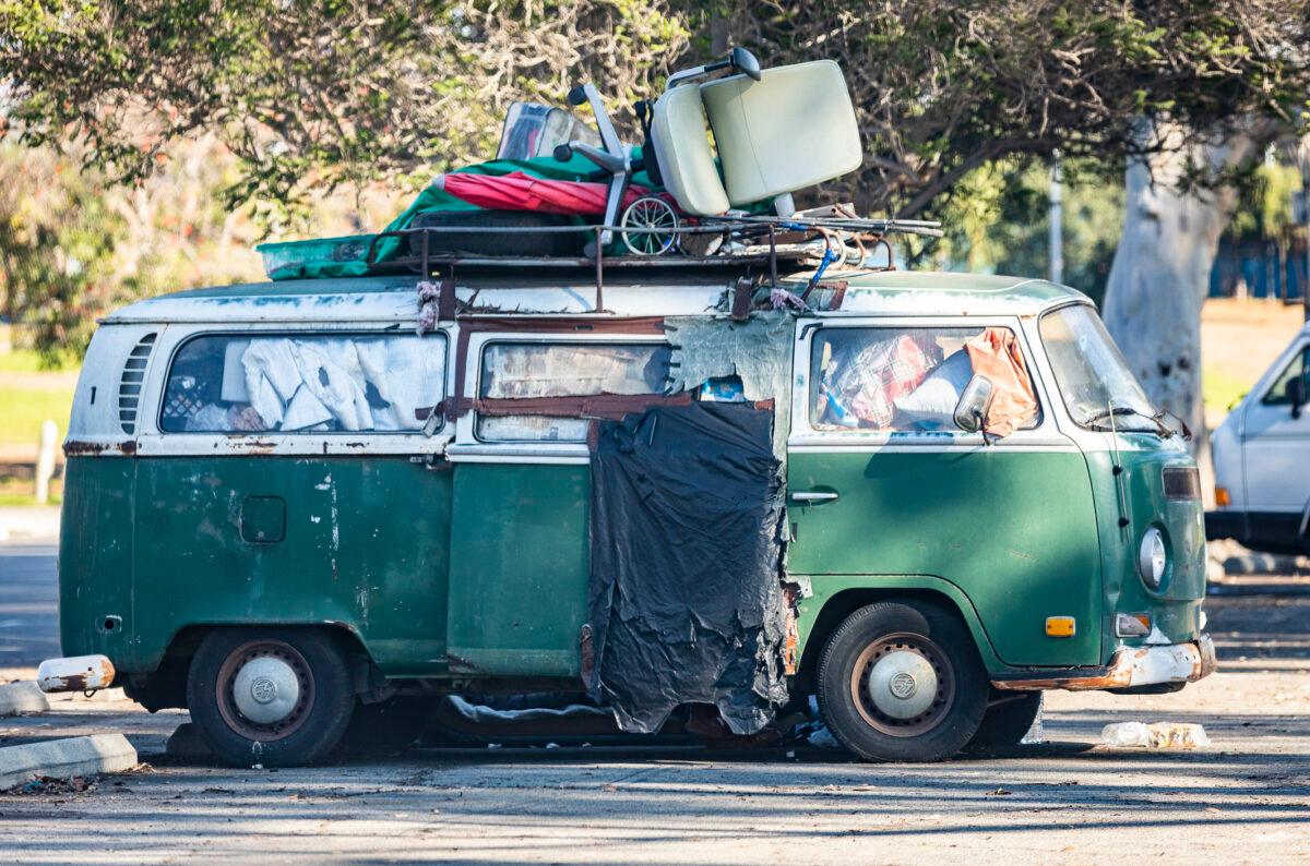Homeless individuals live in their vehicles parked in the city of Westchester, Calif., on Dec. 12, 2021. (John Fredricks/The Epoch Times)