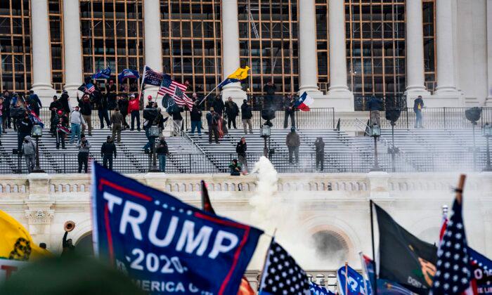 Supporters of President Donald Trump clash with Capitol police during a riot at the Capitol in Washington, on Jan. 6, 2021. (Getty Images)