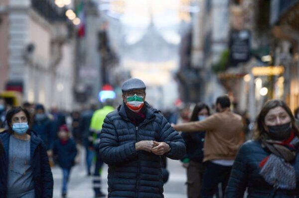 A pedestrian stands in a street of Rome, on Dec. 23, 2021. (Filippo Monteforte/AFP via Getty Images)