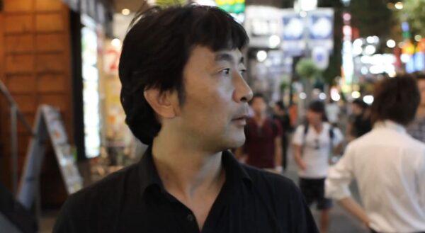 Masashi Hiroyuki (Masashi Nagadoi) believes someone is following him in “Final: The Rapture.” (RiverRain Productions)