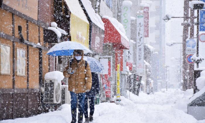Japan Hit With Heavy Snow, Halting More Than 100 Domestic Flights