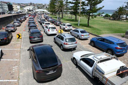 Residents queue up inside their cars for PCR tests at the St Vincent's Bondi Beach COVID-19 drive-through testing clinic ahead of Christmas in Sydney, Australia on Dec. 22, 2021. (Mohammad Farooq/AFP via Getty Images)