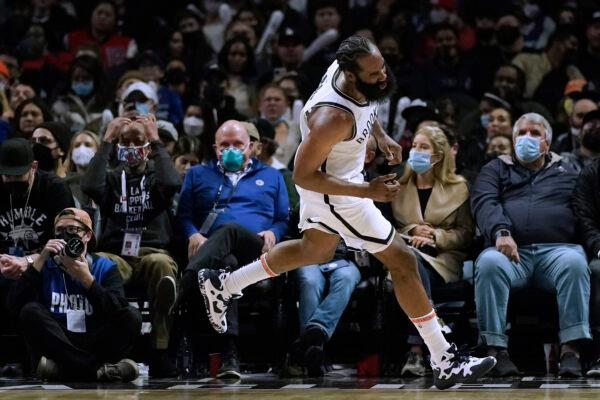 Brooklyn Nets' James Harden reacts after making a basket during second half of the team's NBA basketball game against the Los Angeles Clippers in Los Angeles, on Dec. 27, 2021. (Jae C. Hong/AP Photo)