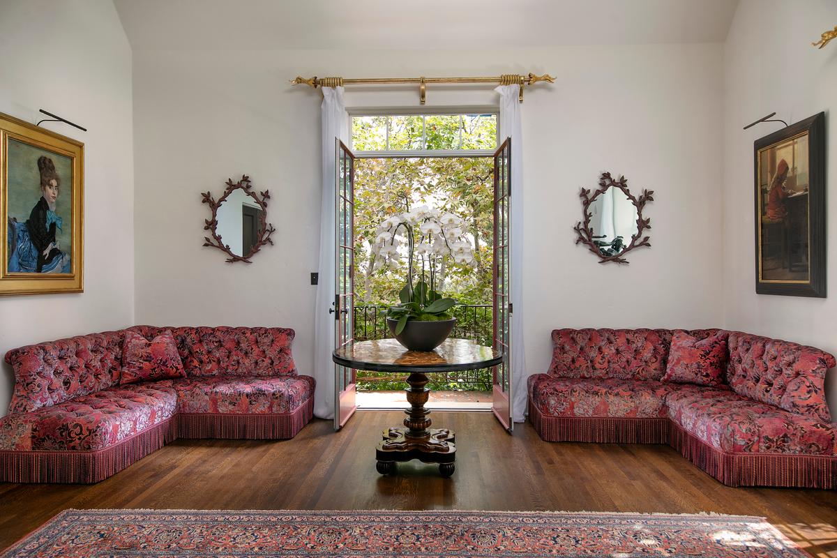 Many of the rooms of the house open onto, or have views of, the magnificent gardens, trees, and lawns outside. The lush landscaping is perhaps the most memorable feature of the property. (Courtesy of Jim Bartsch/Jade Mills)
