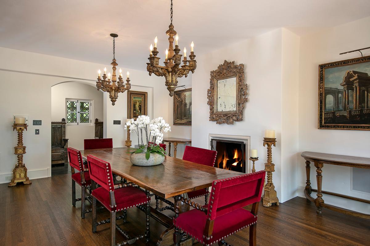 The dining room at Siena Way is yet another classic from the time, a warm and inviting space with just the right luxurious accents. This room exudes a quiet reminder of the Tudor Revivalist movement popular in this era. (Courtesy of Jim Bartsch/Jade Mills)