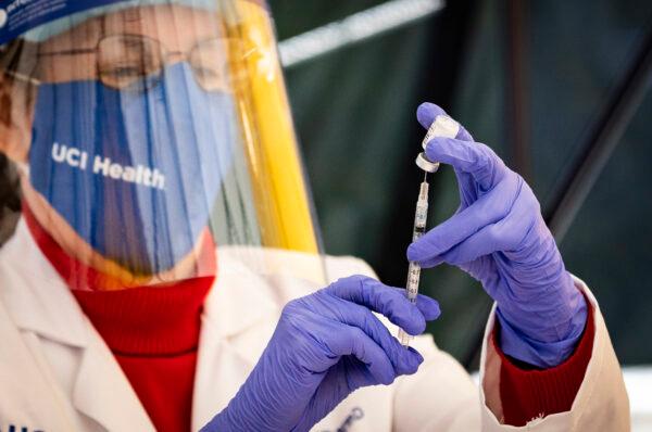 A COVID-19 vaccine administered in Orange, Calif., on Dec. 16, 2020 in a file photo. (John Fredicks/The Epoch Times)