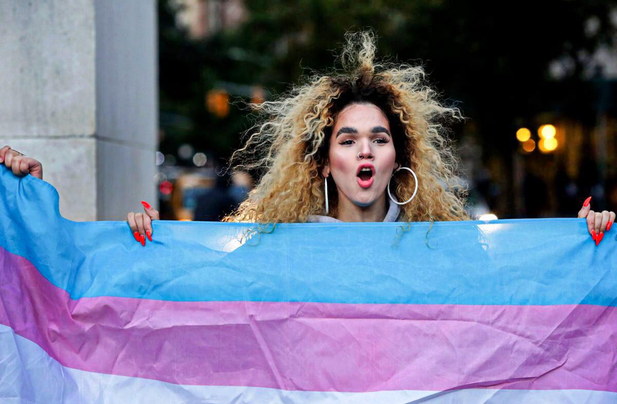 A person holds a transgender flag at Washington Square Park in New York on Oct. 21, 2018. (Yana Paskova/Getty Images)
