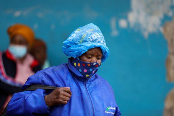 A woman walks in a town in the Eastern Cape province of South Africa, on Dec. 2, 2021. (Siphiwe Sibeko/Reuters)