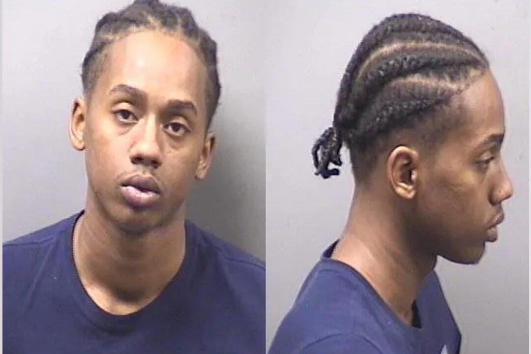 Illinois Police Seek 2 in Killing of 1 Cop, Wounding of 2nd