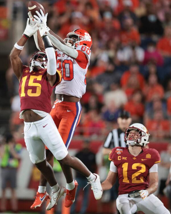 Beaux Collins #80 of the Clemson Tigers makes a reception as Myles Purchase #15 of the Iowa State Cyclones defends during the third quarter in the Cheez-It Bowl Game at Camping World Stadium, in Orlando, Fla., on Dec. 29, 2021. (Douglas P. DeFelice/Getty Images)