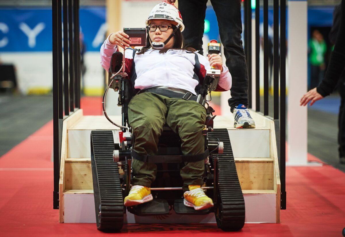 Cho Yu Ng of Hong Kong competes during the wheelchair race in Kloten, Switzerland, at the Cybathlon Championship, the first edition of an international competition organized by ETH Zurich for physically impaired athletes using bionic assistive technology, such as robotic prostheses, brain-computer interfaces, and powered exoskeletons, on Oct. 8, 2016. (Michael Buholzer/AFP via Getty Images)