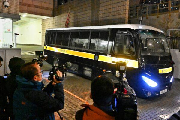 A police van carrying Stand News former editor-in-chief Chung Pui-kuen left West Kowloon Magistrates' Courts, after been denied bailed in Hong Kong, on December 30, 2021. (Sung Pi-lung/The Epoch Times)