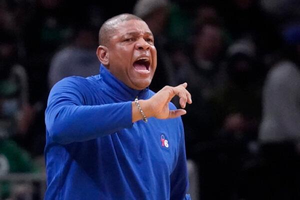 Philadelphia 76ers head coach Doc Rivers calls to his players during the first half of an NBA basketball game against the Boston Celtics in Boston on Dec. 20, 2021. (Charles Krupa/AP Photo)