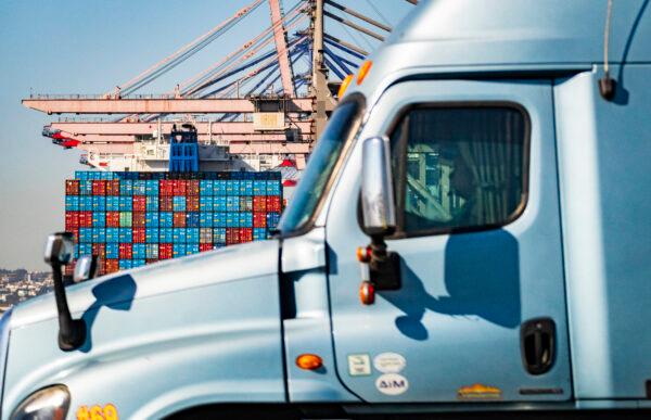 A semi-truck arrives to the Port of Long Beach on Oct. 14, 2021. (John Fredricks/The Epoch Times)