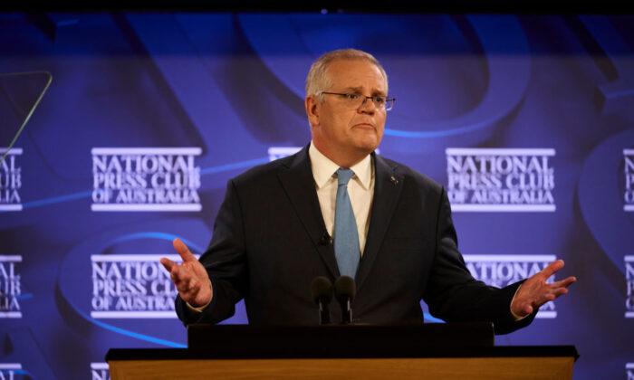 Australian PM Touts COVID-19 Health Response, Economic Management in Election Pitch
