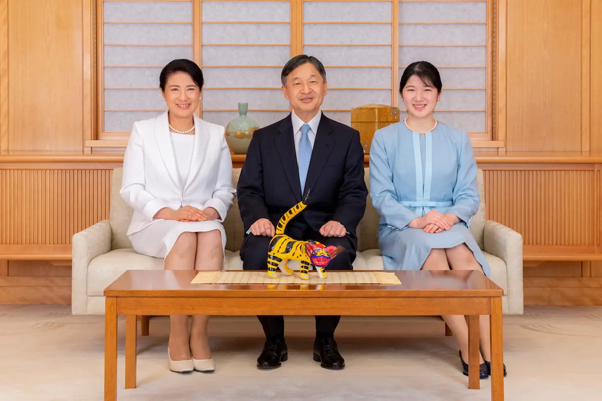 Japanese Emperor Naruhito (C), Empress Masako (L), and their daughter Princess Aiko (R) pose for a photograph during a family portrait session ahead of the New Year, at the Imperial Palace in Tokyo on Dec. 21, 2021. (Imperial Household Agency of Japan via AP)