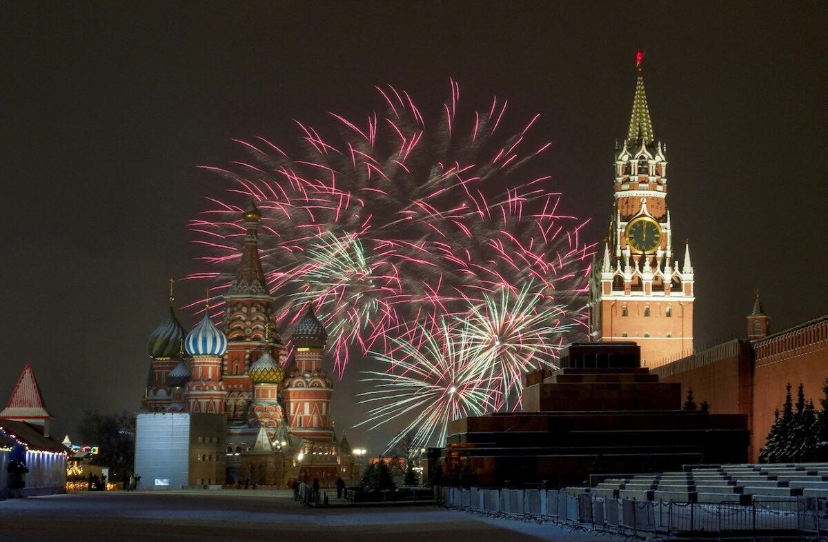 Fireworks explode in the sky over the Kremlin and St. Basil’s cathedral during the New Year's celebrations in Moscow, Russia, on Jan. 1, 2022. (Tatyana Makeyeva/Reuters)