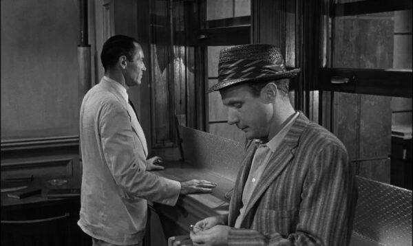 Opposites don’t attract: Juror 8 (Henry Fonda, L) and Juror 7 (Jack Warden), in “12 Angry Men.” (United Artists)