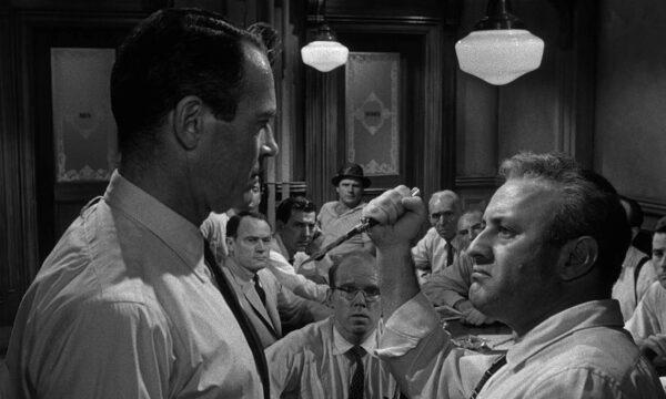 Juror 3 (Lee J. Cobb, R) attempts to bully Juror 8 (Henry Fonda), in “12 Angry Men.” (United Artists)