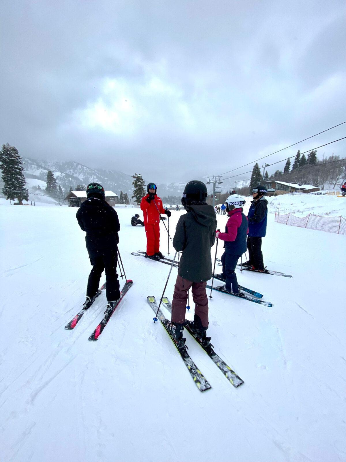 Skiers prepare for a lesson with Jay at the Snowbasin Resort in Ogden, Utah. (Margot Black)