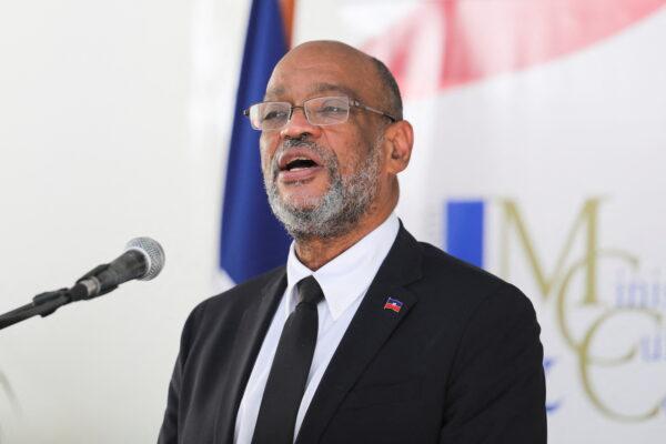 Haitian Prime Minister Ariel Henry speaks at a ceremony for his inauguration as Minister of Culture and Communication, in Port-au-Prince, Haiti, on Nov. 26, 2021. (Ralph Tedy Erol/Reuters)