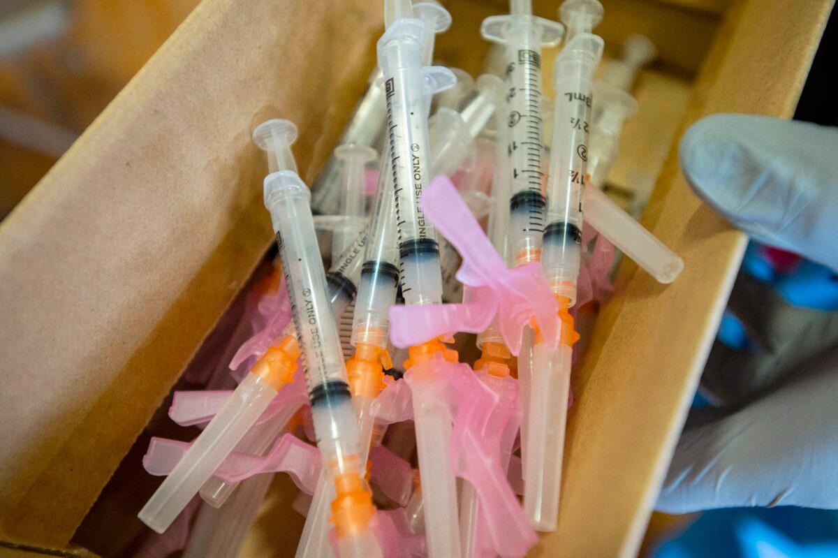 Syringes filled with a COVID-19 vaccine in Central Falls, R.I. (Joseph Prezioso/file/AFP via Getty Images)