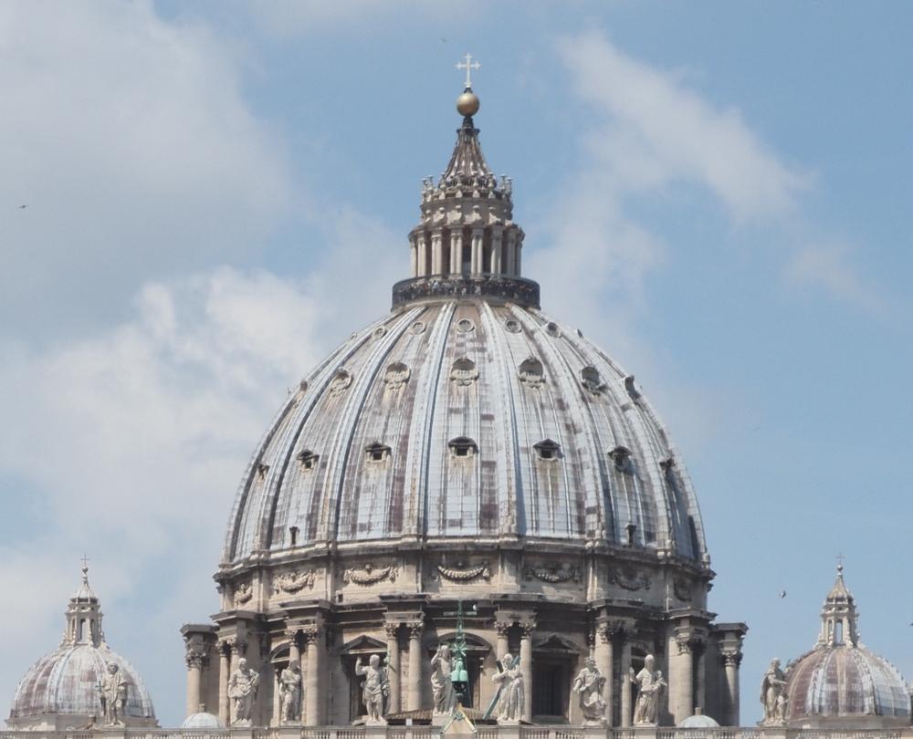 Michelangelo elongated the dome. The shape projected further into the sky and also better transferred the dome’s weight with a more vertical path to the pillars below. The lantern crowns the dome, glowing at night and letting light in during the day. (alexeyart1/Shutterstock)