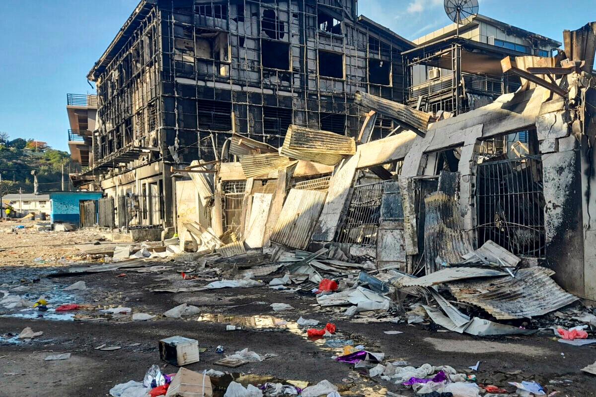 This photo shows the aftermath of a looted street in Honiara's Chinatown, Solomon Islands, on Nov. 27, 2021. (Piringi Charley/AP Photo)