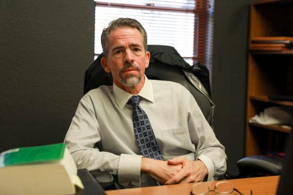 Cochise County Attorney Brian McIntyre in his office in Bisbee, Arizona, on Dec. 8, 2021. (Charlotte Cuthbertson/The Epoch Times)