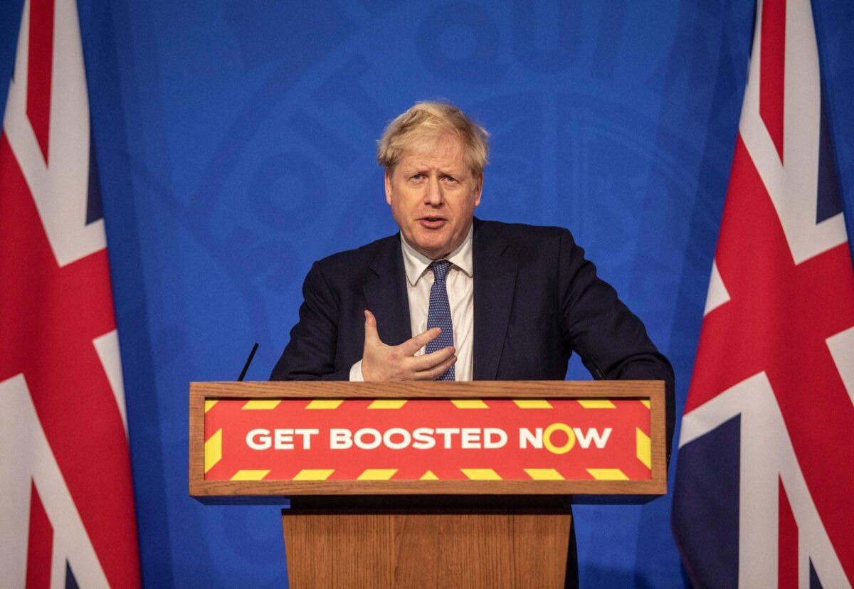 Britain's Prime Minister Boris Johnson speaks during a virtual press conference to update the nation on the status of the COVID-19 pandemic, in the Downing Street briefing room in central London, on Jan. 4, 2022. (Jack Hill/Pool/AFP via Getty Images)