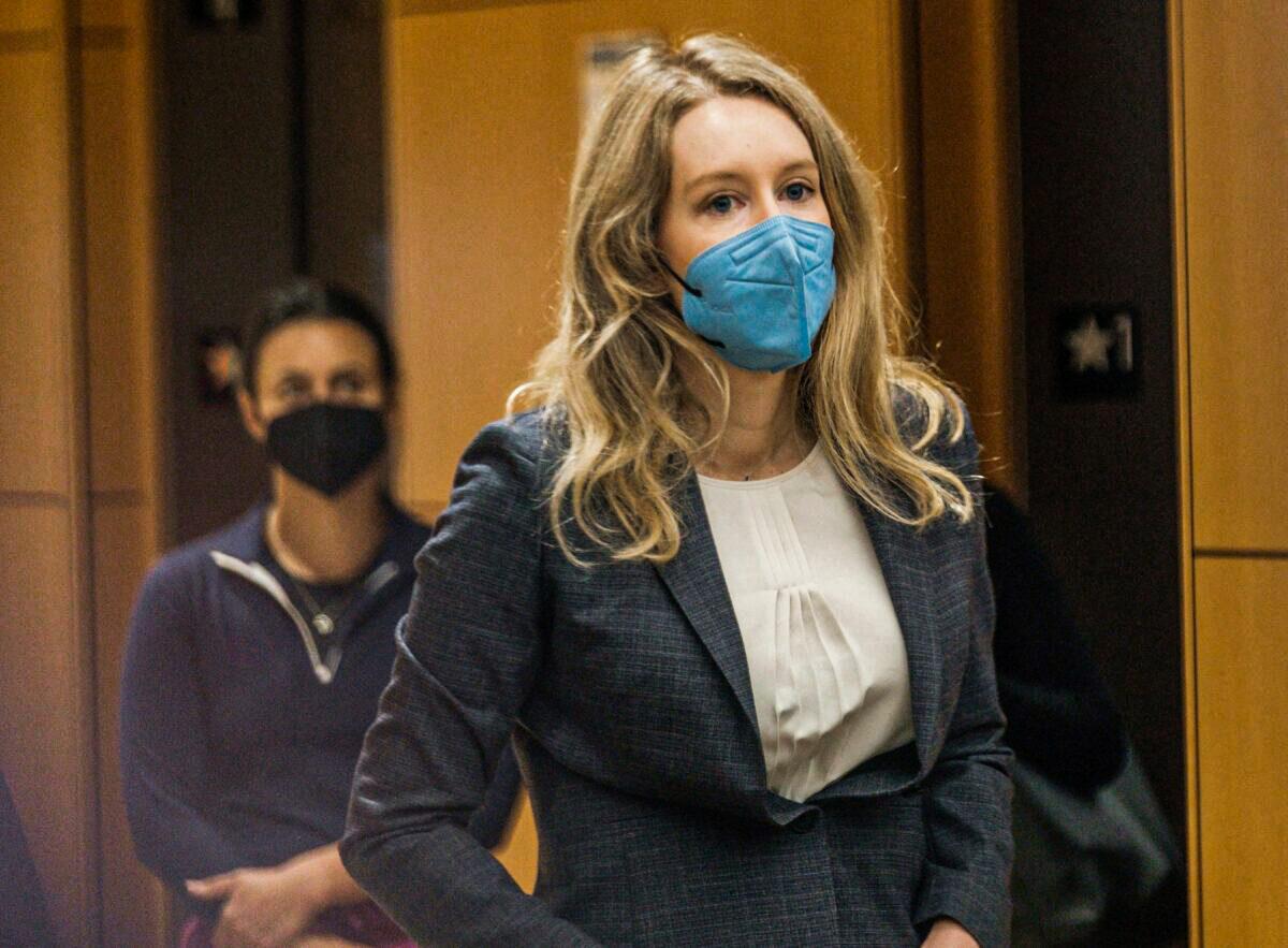 Elizabeth Holmes, the founder and former CEO of blood testing and life sciences company Theranos, arrives for the first day of her fraud trial, outside Federal Court in San Jose, Calif., on Sept. 8, 2021. (Nick Otto/AFP via Getty Images)