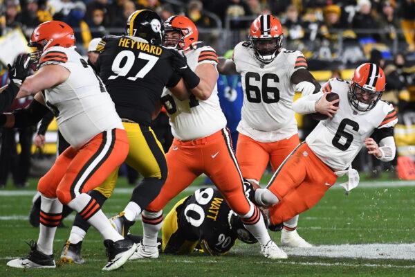 T.J. Watt #90 of the Pittsburgh Steelers sacks Baker Mayfield #6 of the Cleveland Browns during the second quarter at Heinz Field in Pittsburgh, on Jan. 3, 2022. (Justin Berl/Getty Images)