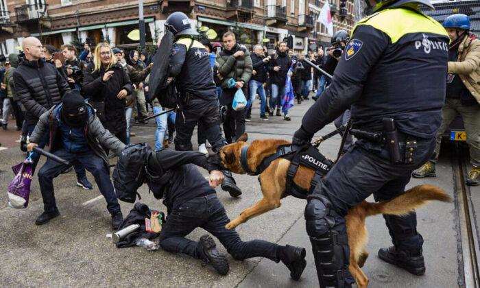 Police Use Dogs as Thousands Protest Against Dutch COVID-19 Lockdowns