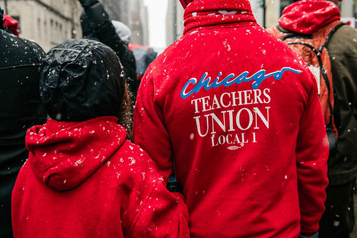 Chicago public school teachers march through the streets near City Hall during a strike in Chicago on Oct. 31, 2019. (Scott Heins/Getty Images)